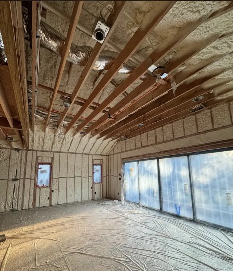 Interior walls and ceiling insulated with spray foam during new construction in North Alamo